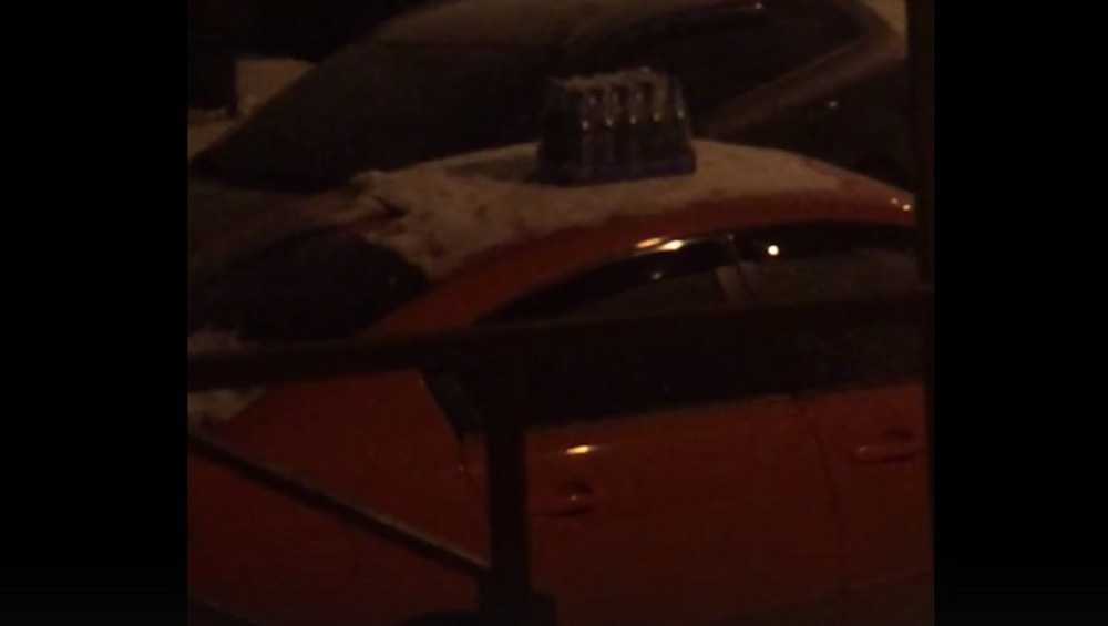 Брянец обнаружил на крыше своего автомобиля ящик с пустыми бутылками